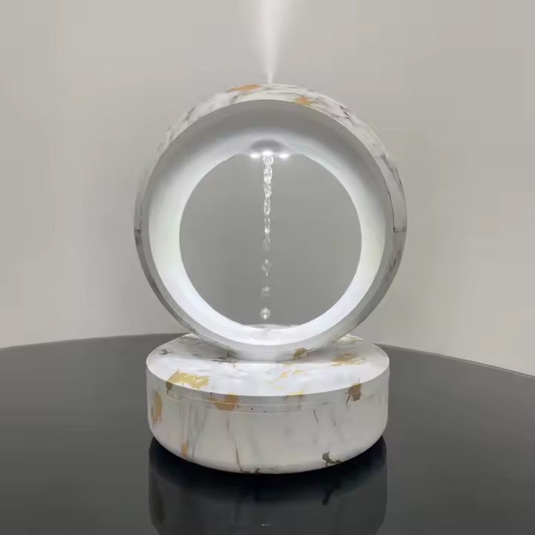 Portable anti-gravity humidifier with levitating water droplets